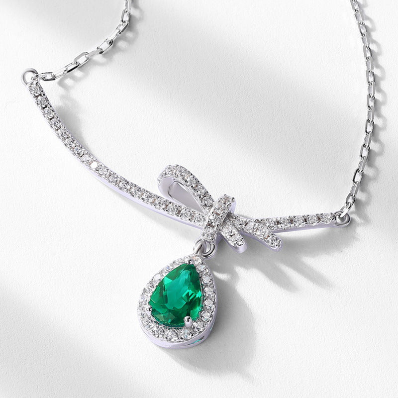 Teardrop Shaped Gemstone Emerald and Zirconia Bow Necklace S925 Silver 0.53 Carats Total