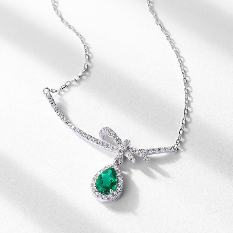 Teardrop Shaped Gemstone Emerald and Zirconia Bow Necklace S925 Silver 0.53 Carats Total